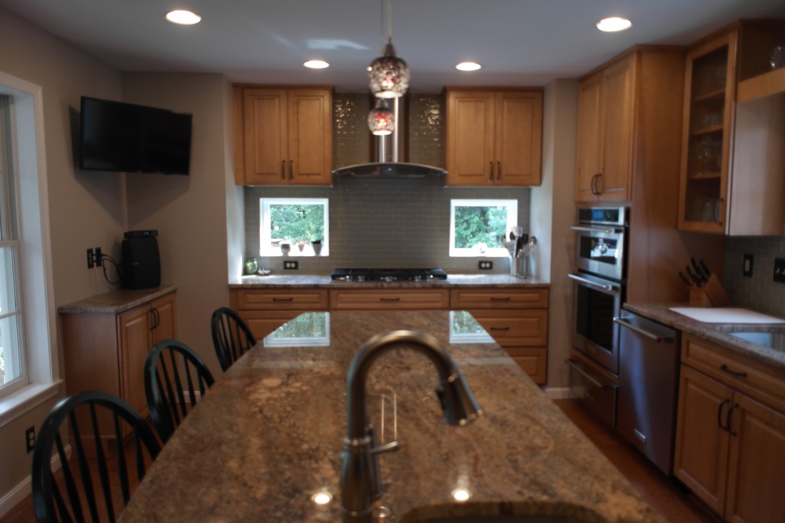 Kitchen remodeling with brown cabinets